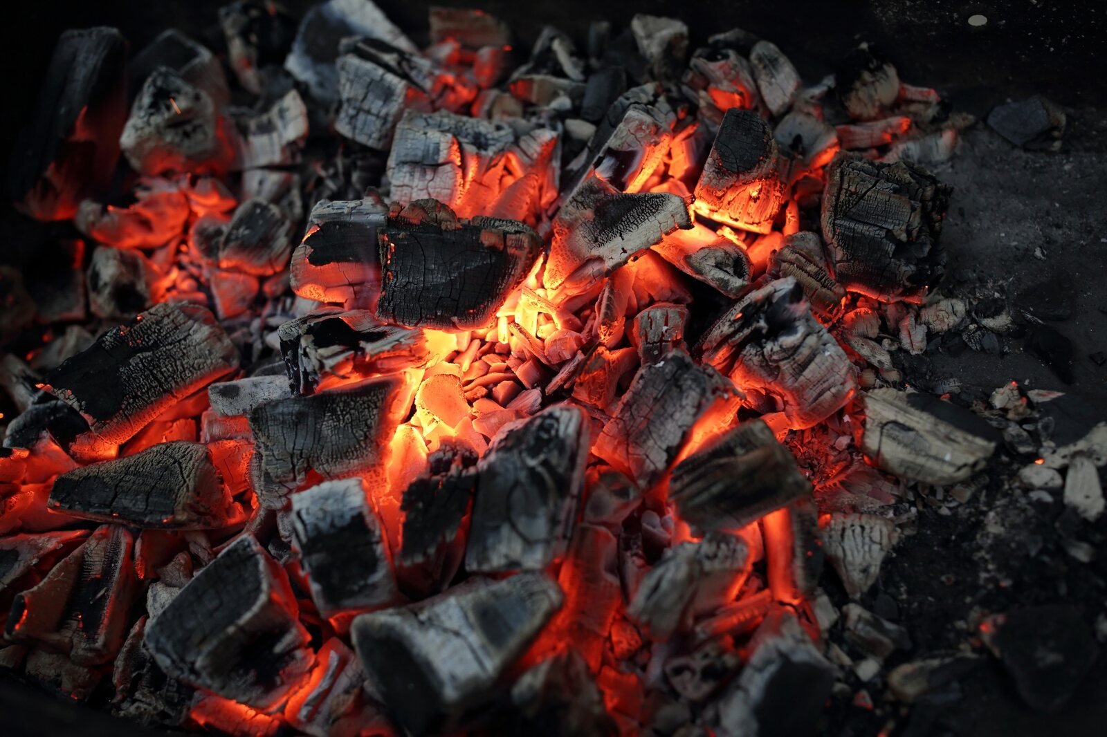 Biochar glowing during a controlled production process